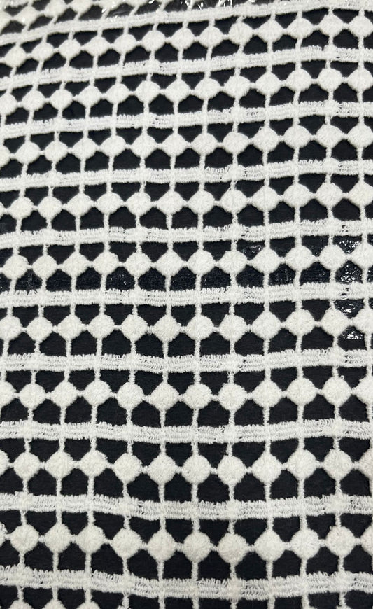 "This unique  white GPO lace fabric is made from 100% pure cotton and features a stunning textured geometric pattern (or diamond/honeycomb weave). The material is super soft and breathable for all-day comfort, and since it's dyeable, it's perfect for tailoring unique Indo-Western dresses, stylish kurtis, or high-fashion overlays!