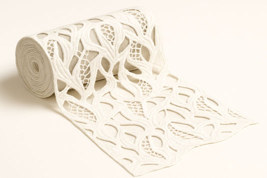 "Unlock your creativity with this 100% breathable cotton GPO lace fabric! This premium dyeable white textile showcases a gorgeous, intricate leaf and wave guipure pattern. Just like the dress the model wears (in the sample photo!), this fabric is super soft and drapes beautifully, making it perfect for custom bridal overlays, breezy resort wear, or a unique Indo-Western outfit."