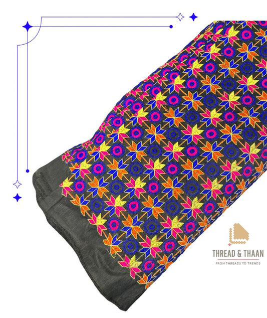 Premium black silk brocade fabric for sherwanis, lehengas and ethnic wear