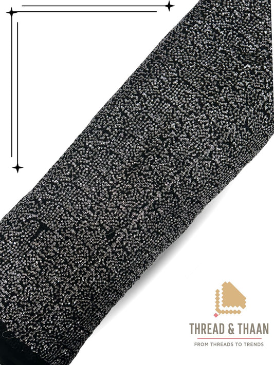 Black shimmer georgette fabric with glitter texture for festive outfits