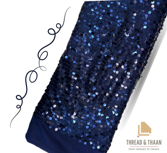 Royal blue sequin work tissue fabric featuring blue and silver sparkly accents