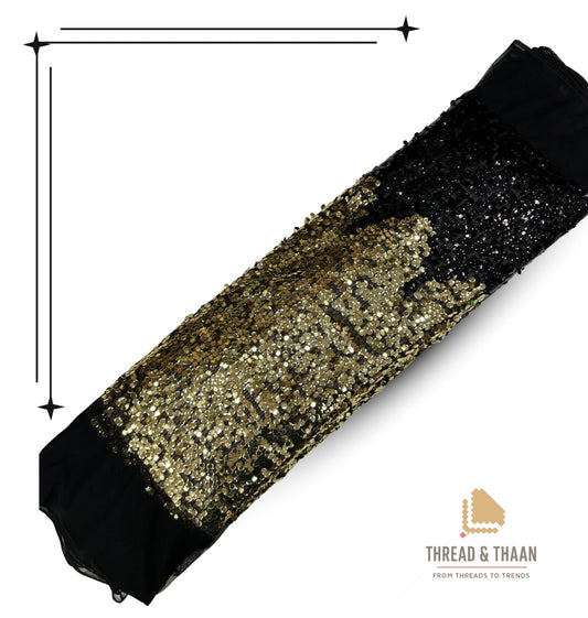 Premium Black and Gold Sequin Net Fabric with a unique gradient or dual-tone shimmer, perfect for glamorous gowns, sarees, and cocktail dresses.