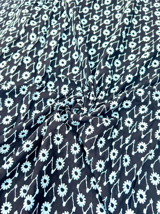 Black contrast floral embroidered fabric with white thread and sequin work for festive wear