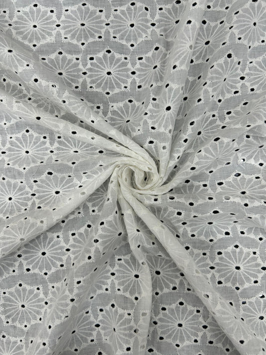 White Hakoba Schiffli cotton fabric roll with intricate floral cutwork embroidery, perfect for designer kurtis, tops, tunics, and elegant summer dresses.