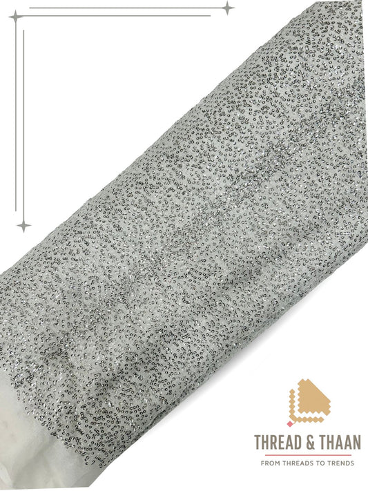 Off-white glitter georgette fabric with shimmer texture for designer wear