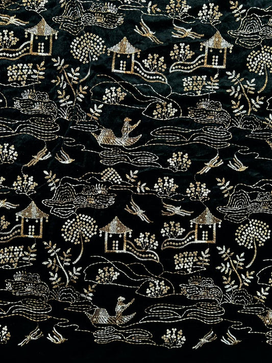 Premium coffee-brown embroidered velvet fabric with scenic houses and nature motifs.